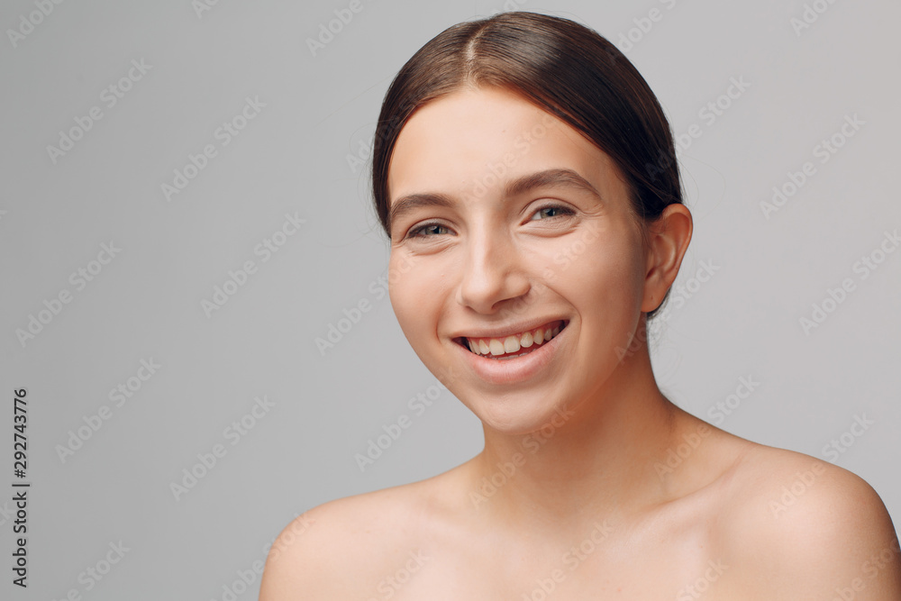 Portrait of young woman model in studio with natural make-up. Makeup concept. Portrait of young woman model in studio with natural make-up. Makeup concept.