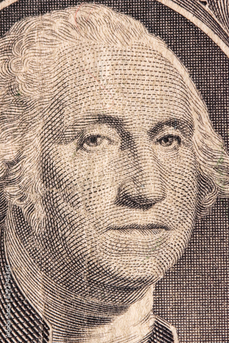 Fragment of a banknote one american dollar. Photographed close-up.