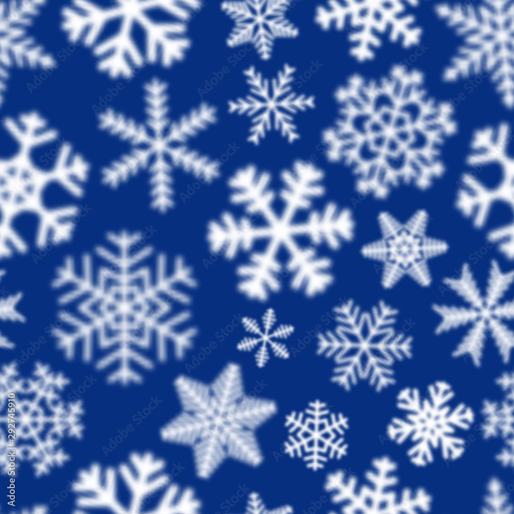 Christmas seamless pattern of white defocused snowflakes on blue background Christmas seamless pattern of white defocused snowflakes on blue background