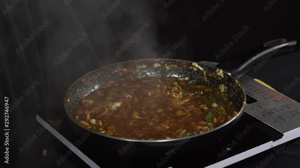 Pan with brown gravy, cooks in the pan on the stove in the kitchen. Close up
Pan with brown gravy, cooks in the pan on the stove in the kitchen. Close up