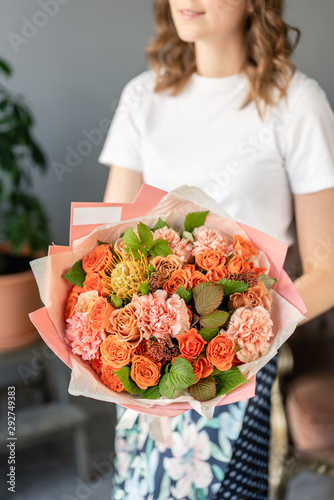 Bouquet Peach and orange color. beautiful hydrangea flowers in a vase on a table . Decoration of home. Wallpaper and background.