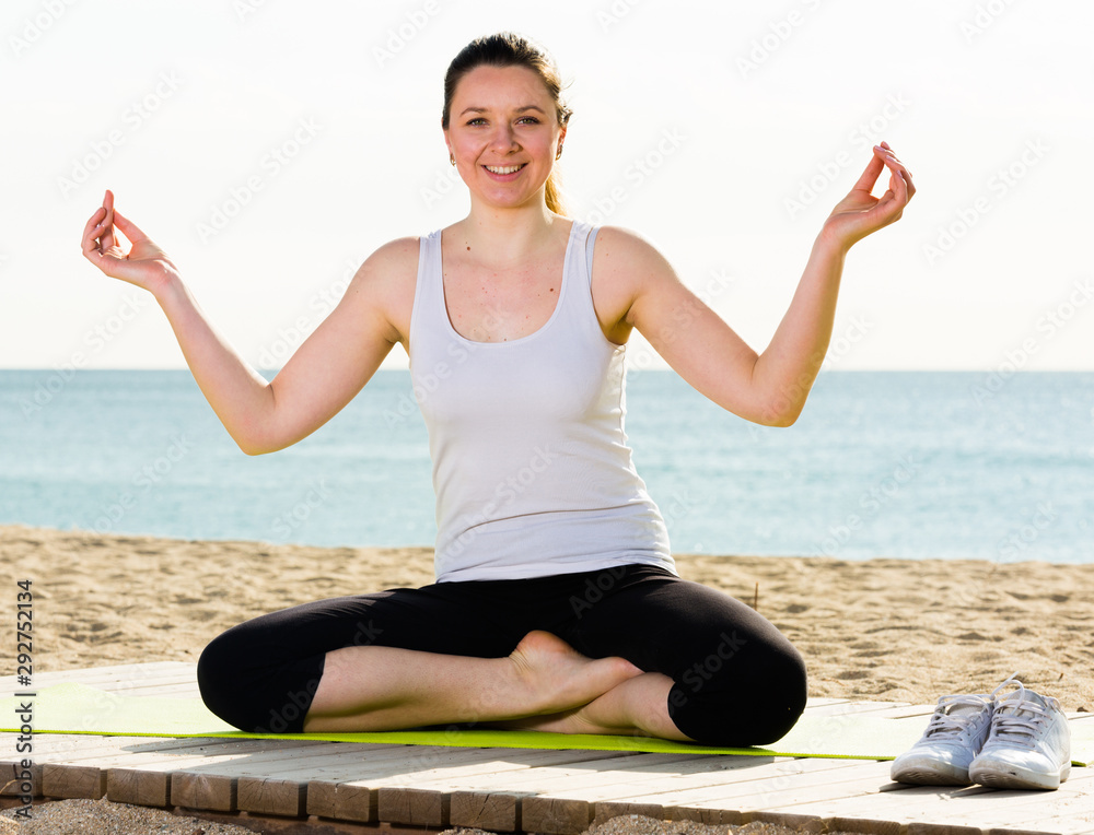 Woman doing yoga cross-legged