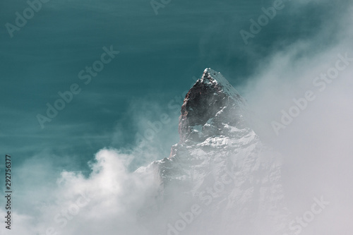 panorama view of Matterhorn behind the clouds