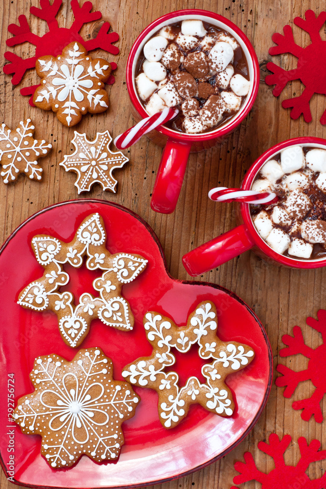 Christmas time composition with mug with  hot chocolate and gingerbread cookies, top view