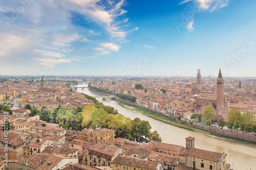 Beautiful view of the panorama of Verona and the Lamberti tower on the banks of the Adige River in Verona, Italy © marinadatsenko