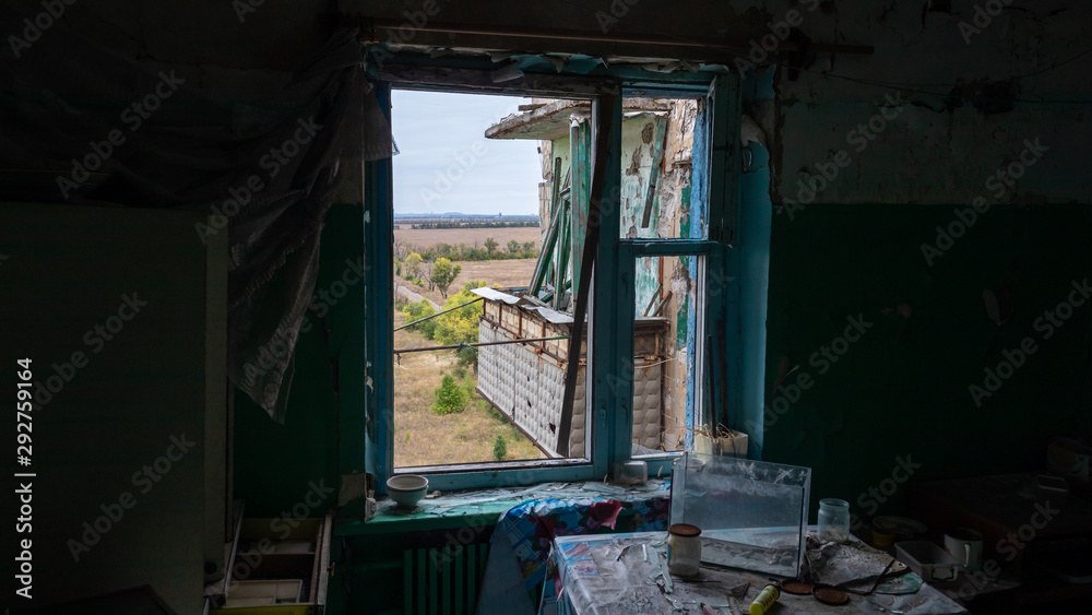 Krasnohorivka, Donetsk region/Ukraine - 24 September 2019: Destroyed by shelling houses and someone homes, the view through windows to Donetsk controlled by prorussian separatists Krasnohorivka, Donetsk region/Ukraine - 24 September 2019: Destroyed by shelling houses and someone homes, the view through windows to Donetsk controlled by prorussian separatists