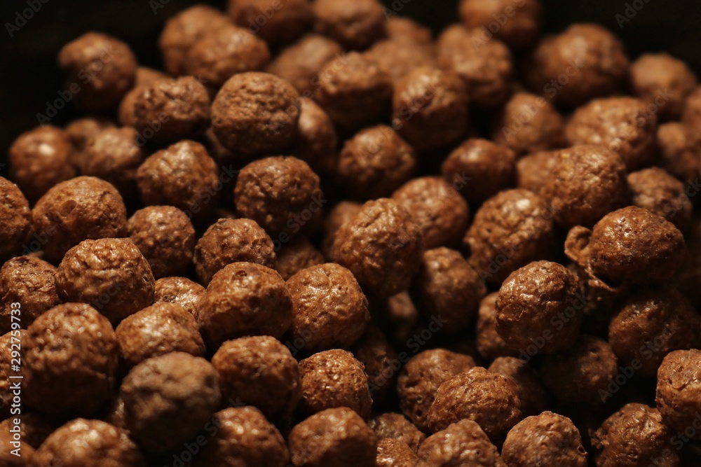 lots of little round brown chocolate flakes lots of little round brown chocolate flakes