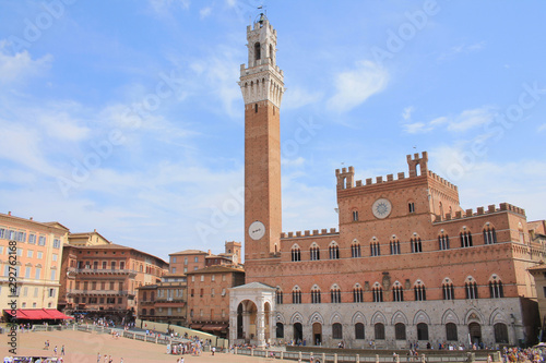 Piazza del Campo with the Pubblico palace and Mangia tower , the principal public space of the historic center of Siena, Tuscany, Italy. It is regarded as one of Europe's greatest medieval squares