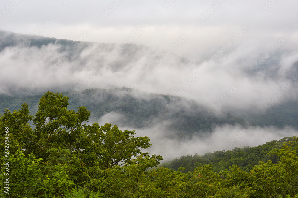 A view of fog and mountains from a Blue Ridge Parkway overlook located north of US Highway 60 near the town of Buena Vista, Virginia