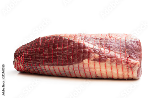 netted pack of raw meat package isolated on white background © lena_zajchikova
