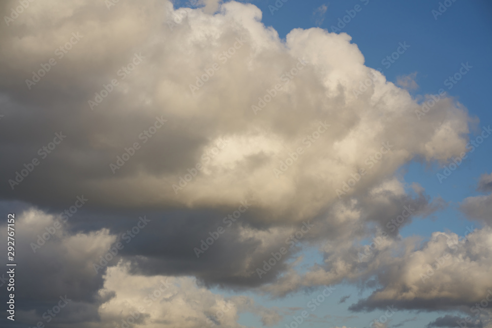 Blue sky and fluffy white clouds. Clouds in the blue sky Blue sky and fluffy white clouds. Clouds in the blue sky