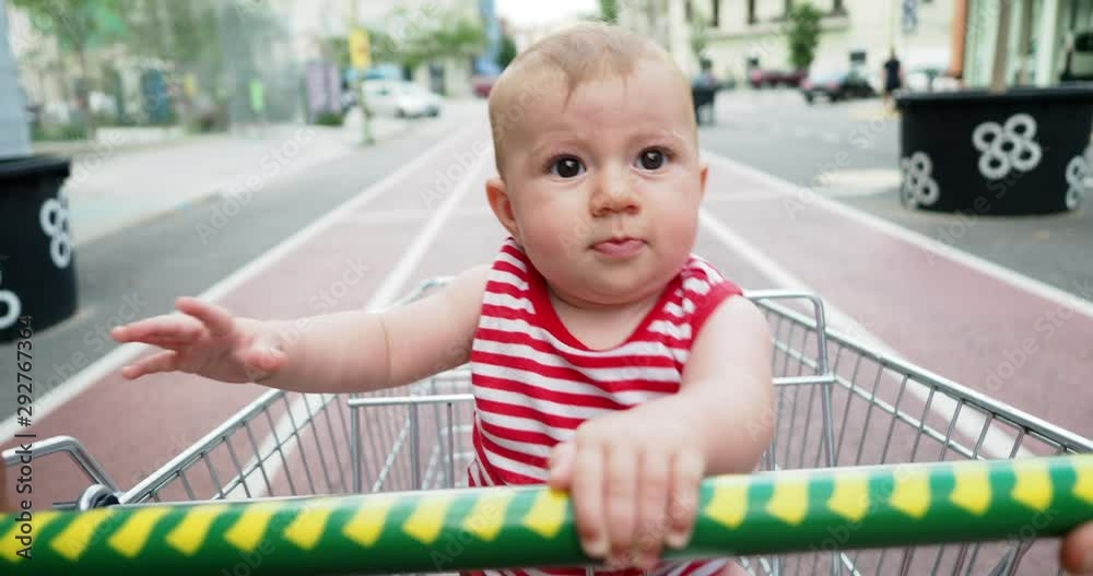 small baby girl happy infant shopping trolley small baby girl happy infant shopping trolley
