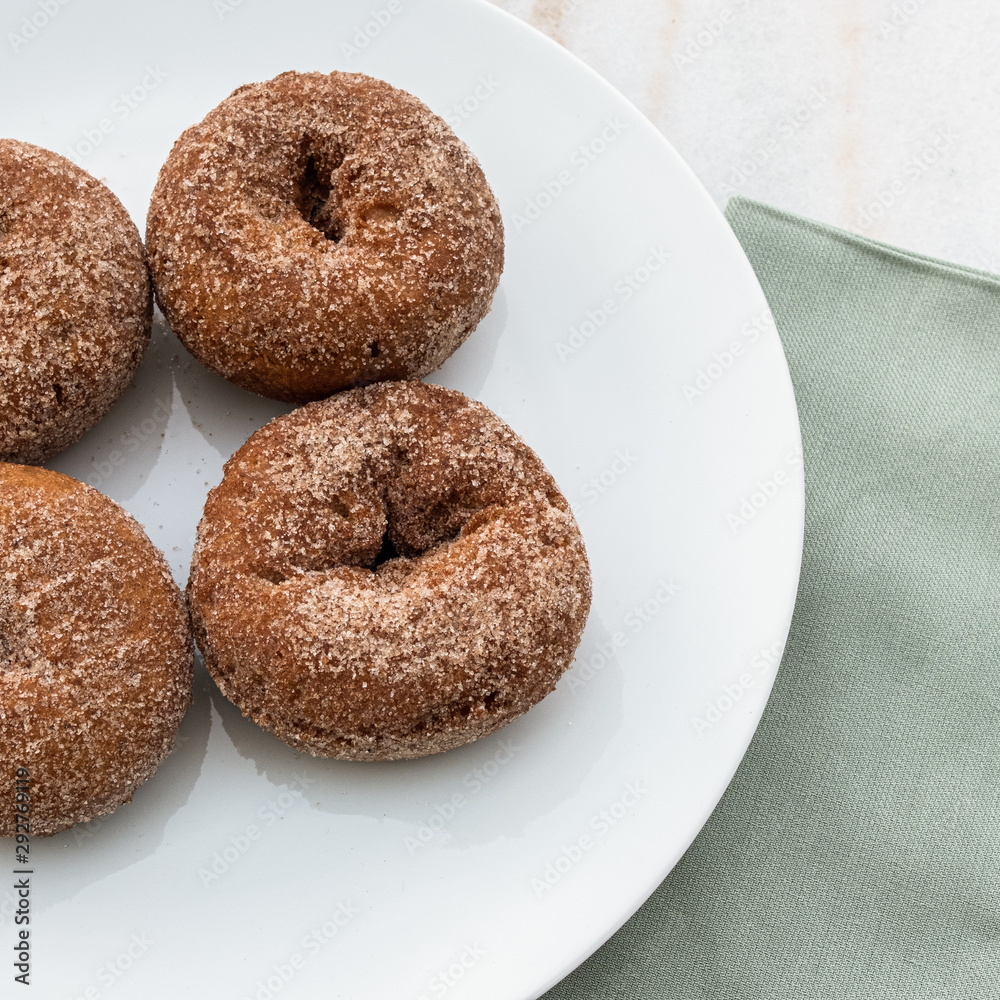 Apple cider donuts on a plate
