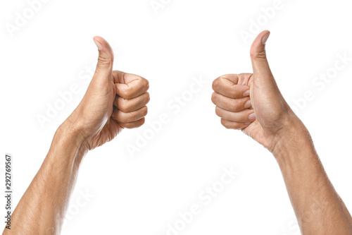 Male hands showing thumb-up gesture on white background