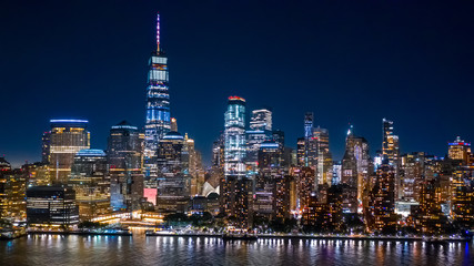 Aerial view of Lower Manhattan skyline by in night in New York City