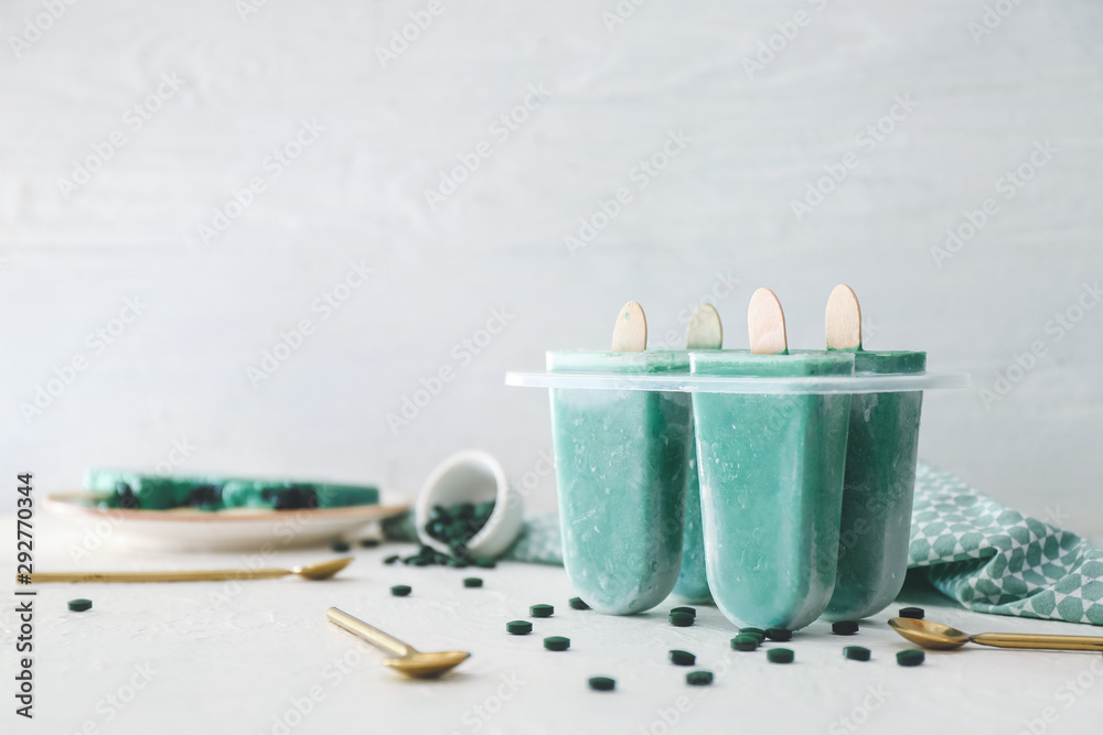 Tasty homemade spirulina ice-cream on table Tasty homemade spirulina ice-cream on table