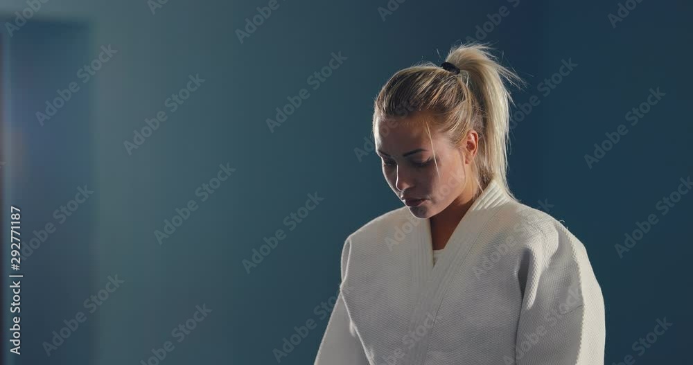 Young athlete is set to fight, a serious focused look. Portrait view.
