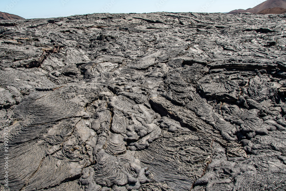 Black lava flow solidified in Santiago Island, Galapagos.