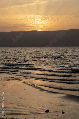 Carta da parati Rays of a Golden Sunset at Sea of Galilee, Israel