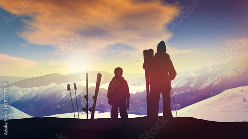 Fotografie Family skiers on top of the mountain.