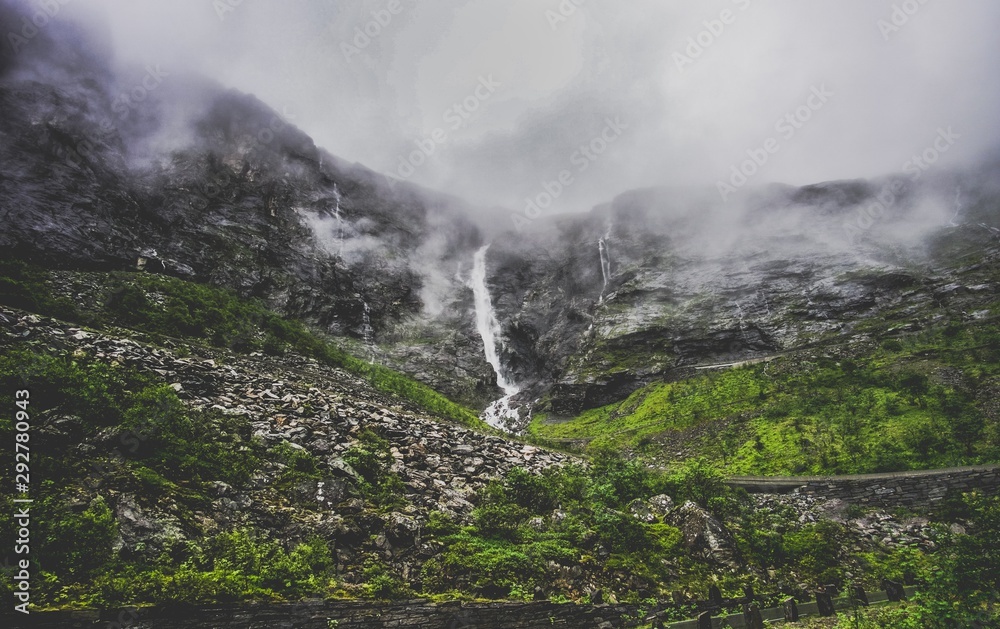 cloudy waterfall in the mountains
