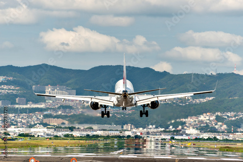 A jet just before landing at the Osaka international airport in Itami, Japan