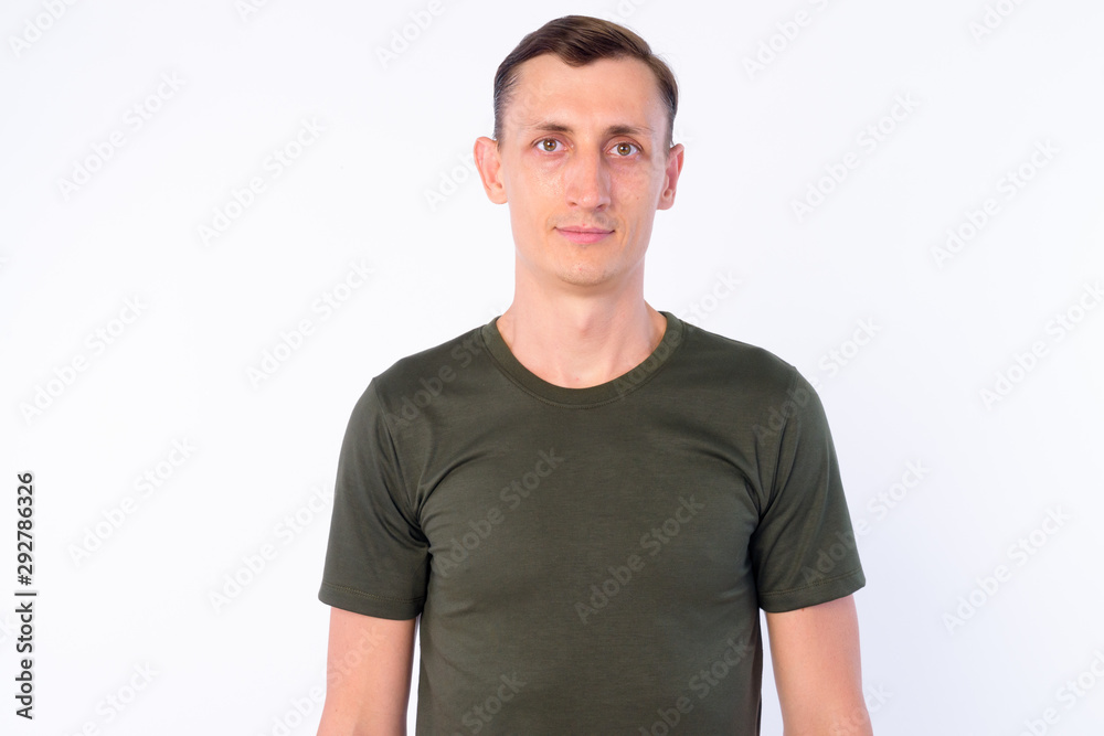 Studio shot of man looking at camera Studio shot of man looking at camera