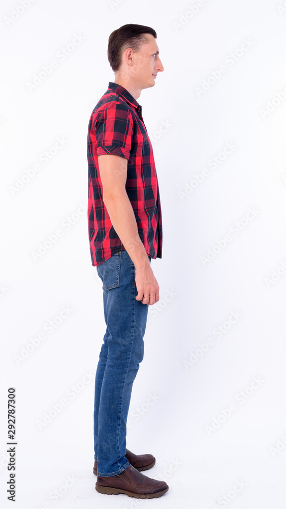 Full body shot profile view of hipster man Full body shot profile view of hipster man