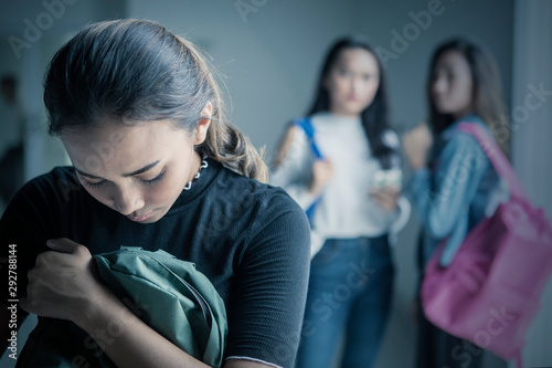 Quadro su tela Depressed teenage girl bullied with her friends