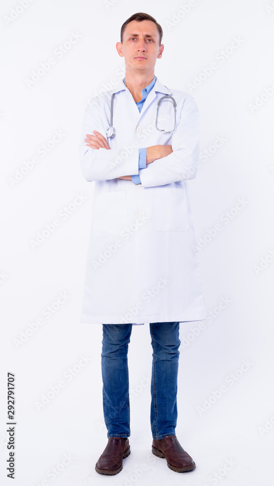 Full body shot of man doctor with arms crossed Full body shot of man doctor with arms crossed