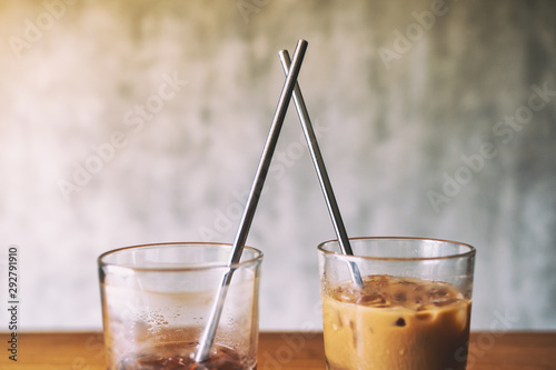 Wallpaper Mural Closeup image of two glasses of iced coffee with stainless steel drinking straw Torontodigital.ca
