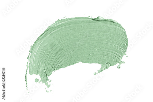Foto Color correcting concealer stroke isolated on white background