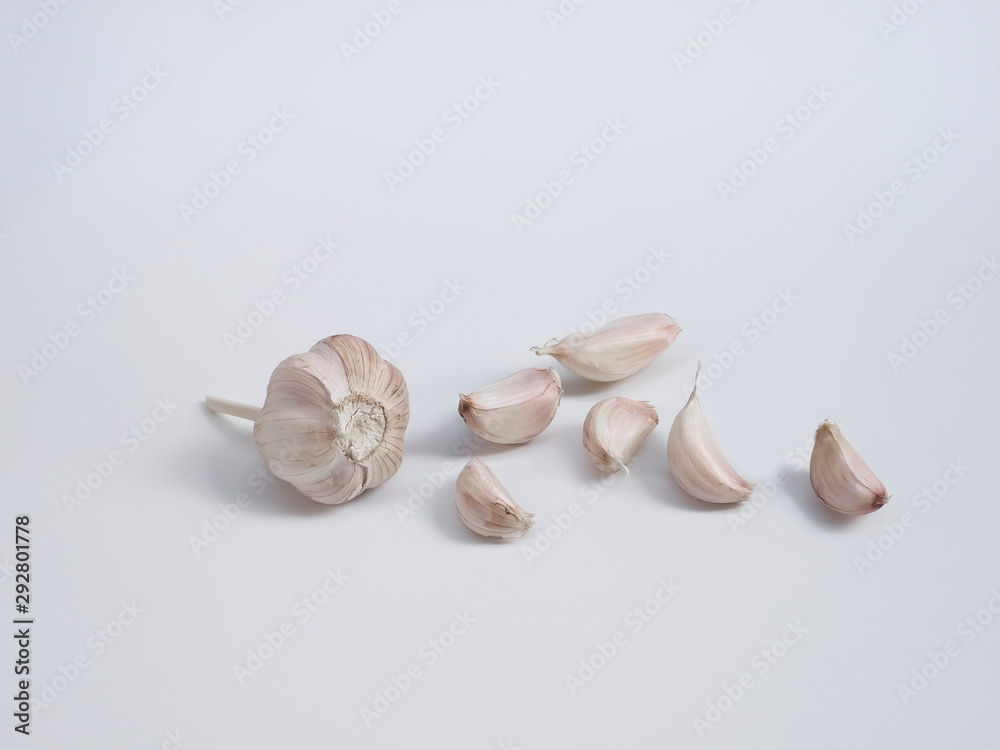 view of Garlic (Allium sativum) isolated on white background. view of Garlic (Allium sativum) isolated on white background.