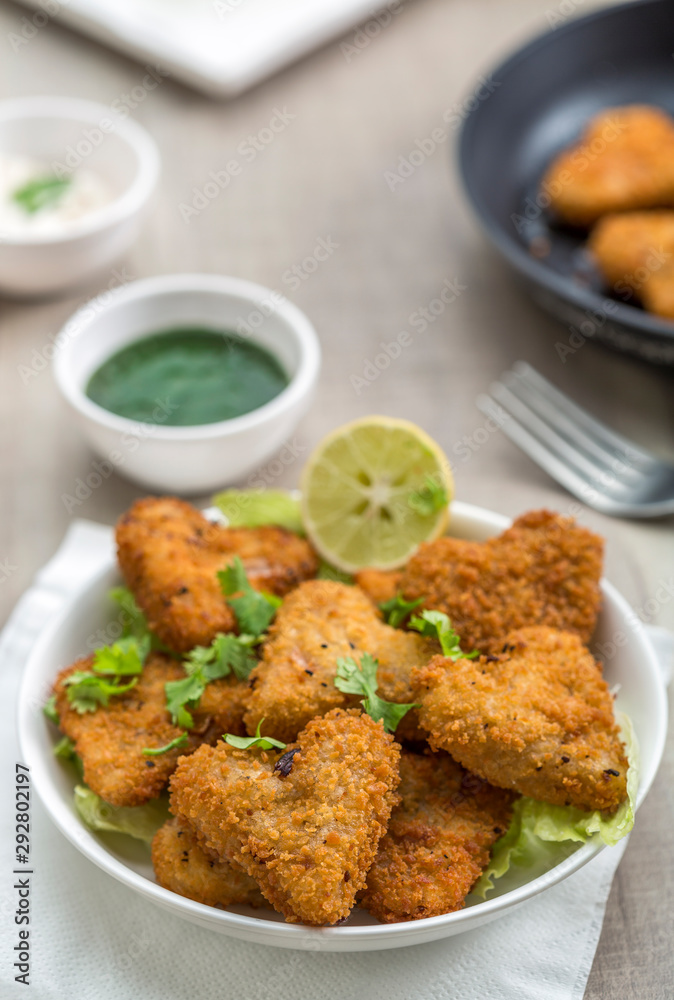 Heart shape cutlets with sauce and green chutney Heart shape cutlets with sauce and green chutney
