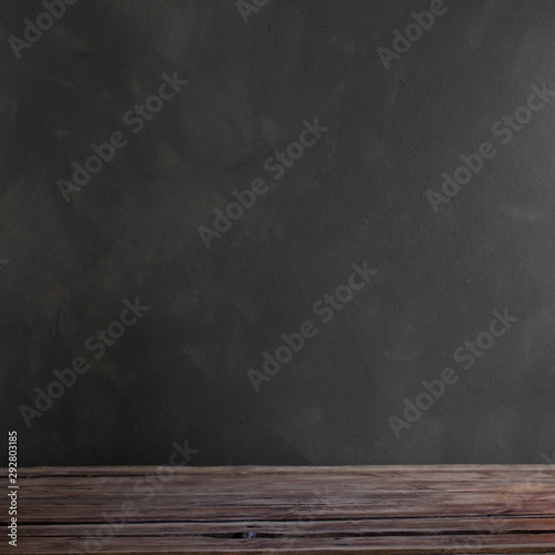 background with wooden table and dark wall
