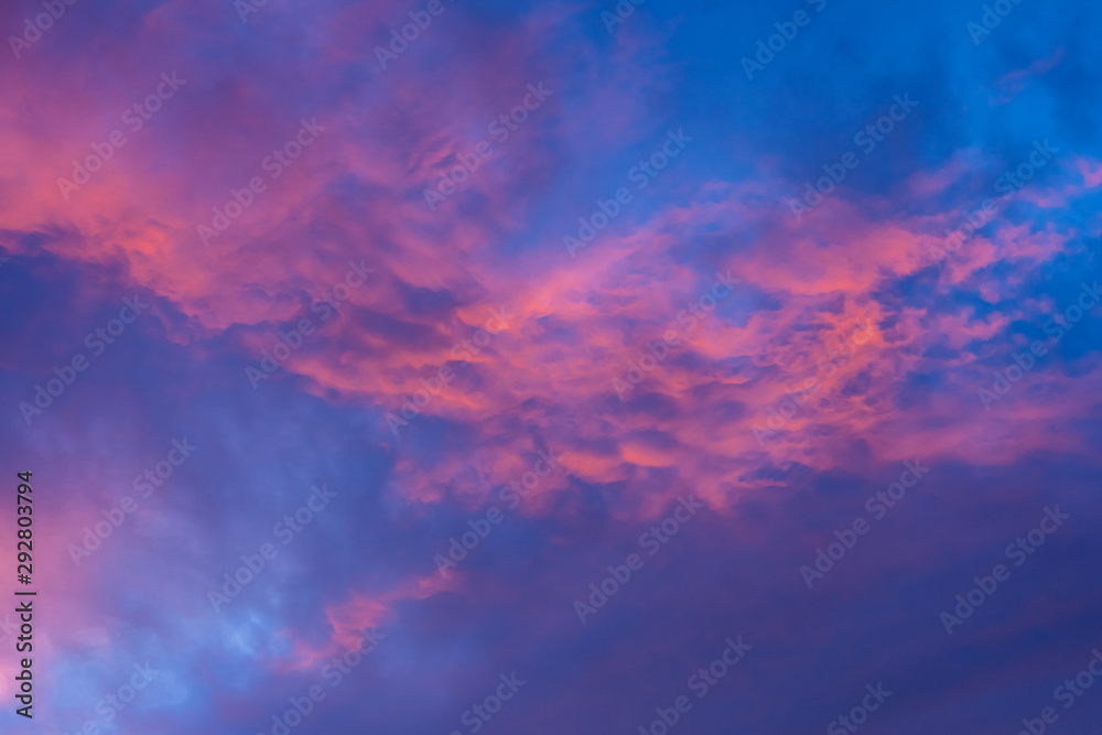 Fototapeta Violet clouds in a dramatic sunset