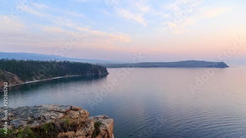 Russia, Lake Baikal, Olkhon Island, the Small Sea Bay. Cape Ulan-Khushun. View from Cape Nyurgan. Transition from sunset to night photo