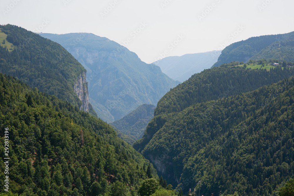 Obraz premium Scenic view to the mountain valley, summertime outdoor background