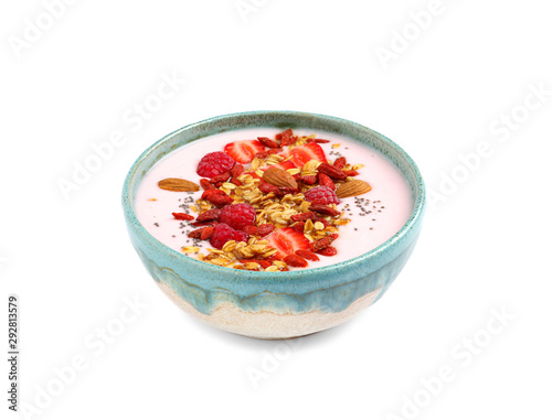 Smoothie bowl with goji berries on white background