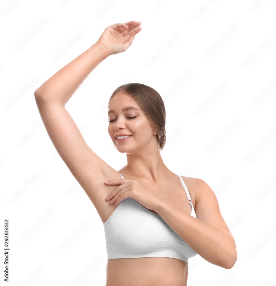 Young woman with smooth clean armpit on white background. Using deodorant Young woman with smooth clean armpit on white background. Using deodorant