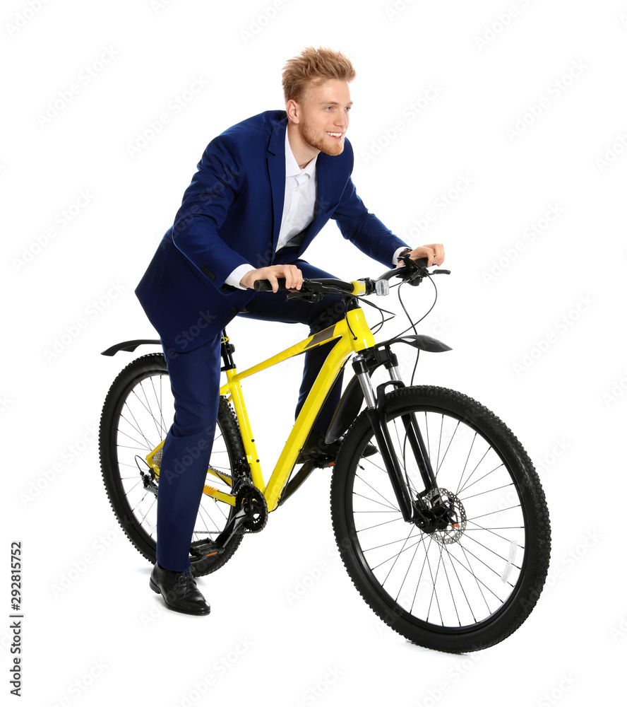 Young businessman riding bicycle on white background Young businessman riding bicycle on white background