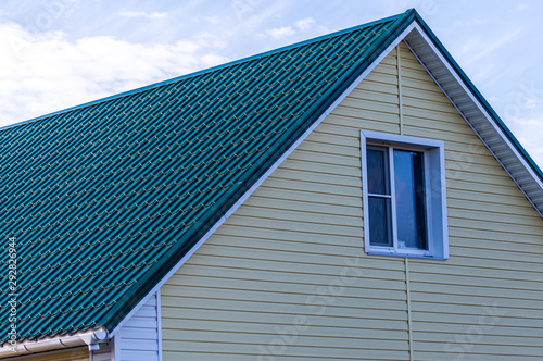 Green roof in a siding house