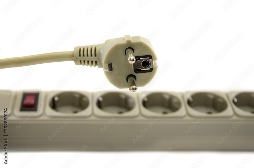gray extension cord isolated on a white background. Close-up. gray extension cord isolated on a white background. Close-up.