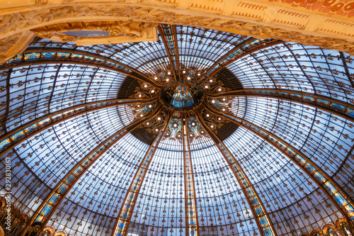 Paris, France - Sept 05, 2019: The glassroof of the Galeries Lafayette interior in Paris. Desinged by The architect Georges Chedanne photo