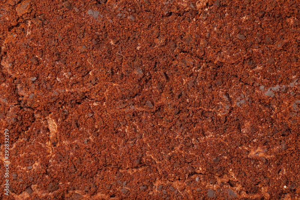 Sweet Background. Brownie cake with coffee powder and chocolate Sweet Background. Brownie cake with coffee powder and chocolate