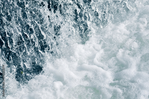 Blue and turquoise water with irregular wave structure