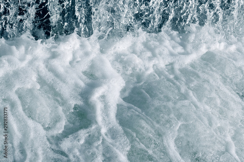 Blue and turquoise water with irregular wave structure