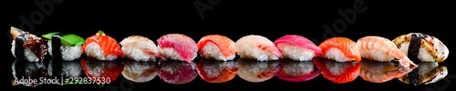 Obraz  z motywem sushi set nigiri on a black background