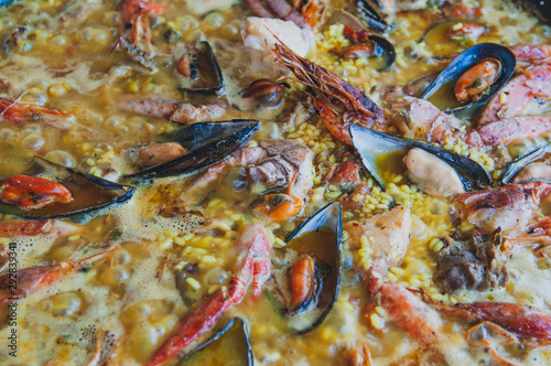 gourmet, pan, seafood, spanish, cooked, paella, cuisine, rice, dinner, food, mediterranean, traditional, saffron, meal, dish, shrimp, spice, yellow, vegetable, lemon, table, prawns, fish, culinary, 