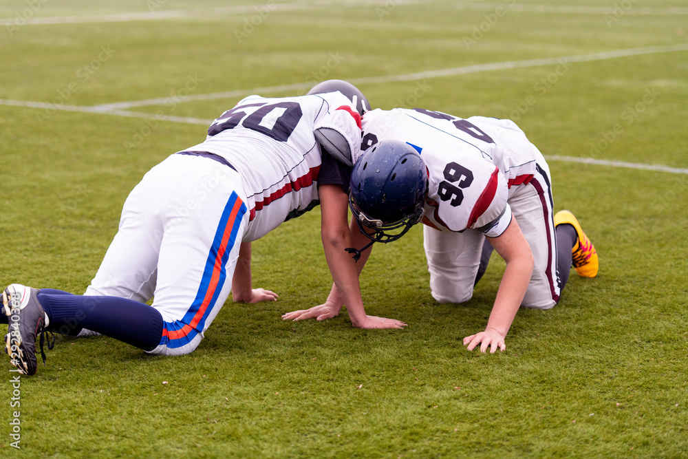 Obraz premium professional american football players training